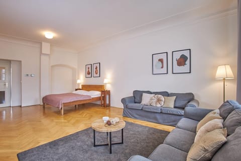 Bed, Living room, Seating area, Bedroom