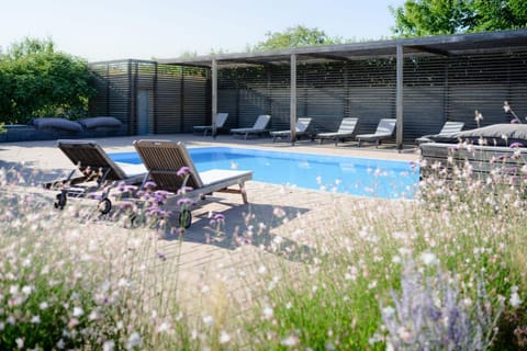 Day, Natural landscape, Garden, Swimming pool, sunbed