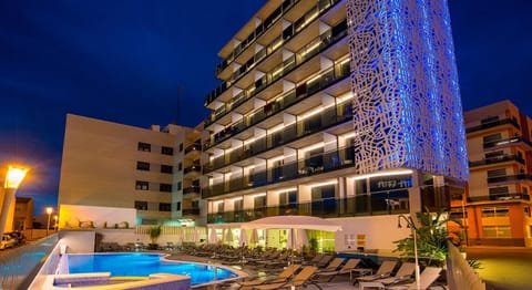 Property building, Night, Swimming pool