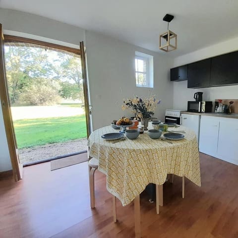 Les Ecuries du Château Docked boat in Normandy