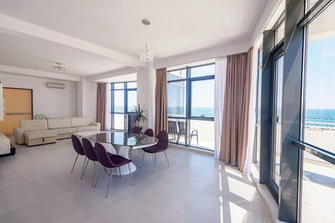 Living room, Seating area, Dining area, Sea view