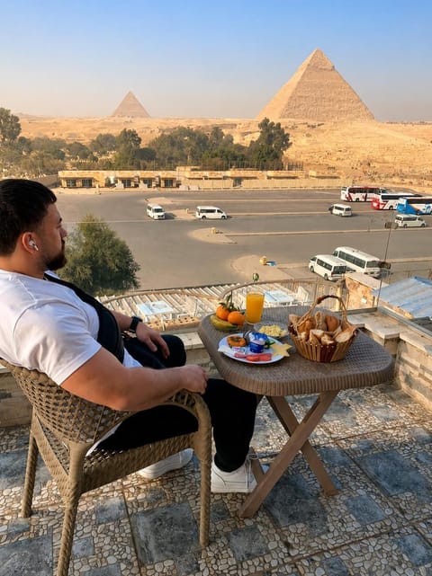 Nearby landmark, Restaurant/places to eat, Day, View (from property/room), Balcony/Terrace, Food and drinks, Seating area, Dining area, Food, Mountain view, Breakfast, Continental breakfast, Drinks