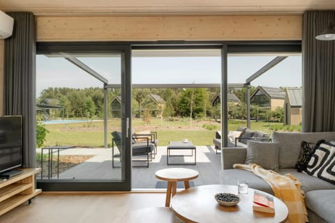 Natural landscape, Garden, TV and multimedia, View (from property/room), Balcony/Terrace, Living room, Seating area, Garden view, Pool view, internet, air conditioner