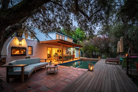 Property building, Patio, Garden, Dining area, Pool view, Swimming pool