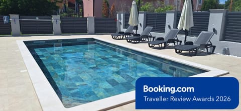 Patio, Day, Pool view, Swimming pool, Certificate/Award, sunbed