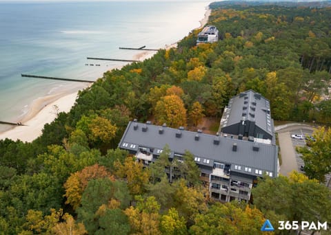 Property building, Nearby landmark, Day, Neighbourhood, Natural landscape, Bird's eye view, Beach, Sea view