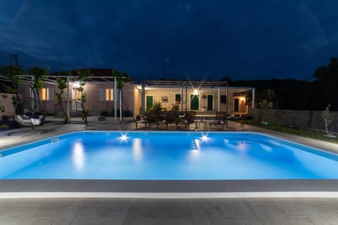 Property building, Night, Pool view, Swimming pool, sunbed