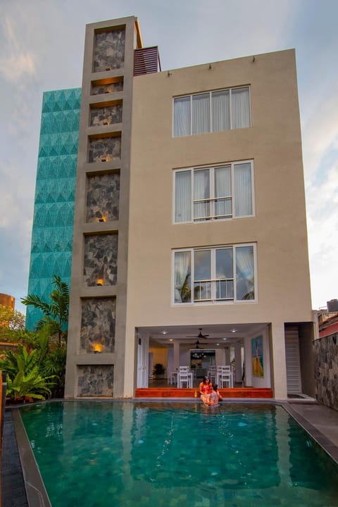 Property building, People, Swimming pool, Swimming pool