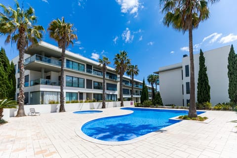 Property building, Patio, Day, Pool view, Swimming pool, sunbed