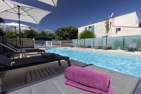 Patio, Day, Natural landscape, Pool view, Swimming pool, sunbed