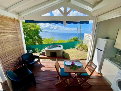Property building, Patio, Day, Natural landscape, Hot Tub, Coffee/tea facilities, View (from property/room), Kitchen or kitchenette, Living room, Dining area, Sea view, oven, washing machine