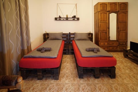 Bed, TV and multimedia, Living room, Seating area, Bedroom, wardrobe