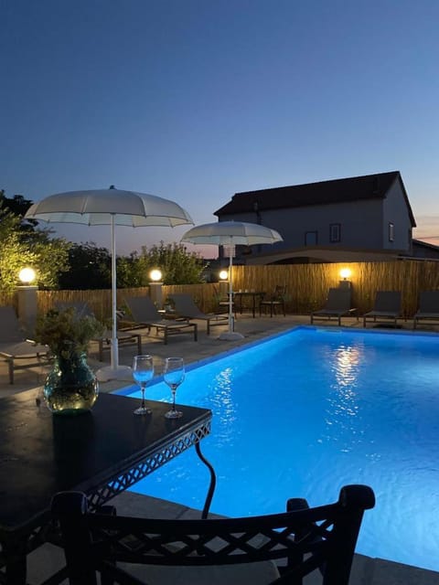 Night, Pool view, Swimming pool, sunbed