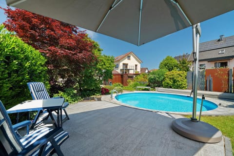 Property building, Living room, Swimming pool