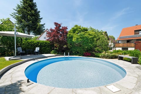 Property building, Living room, Swimming pool