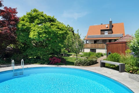 Property building, Living room, Swimming pool