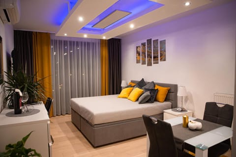 Bed, Seating area, Bedroom