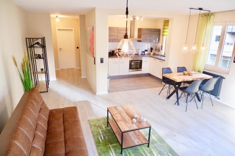 Kitchen or kitchenette, Living room, Seating area, Dining area