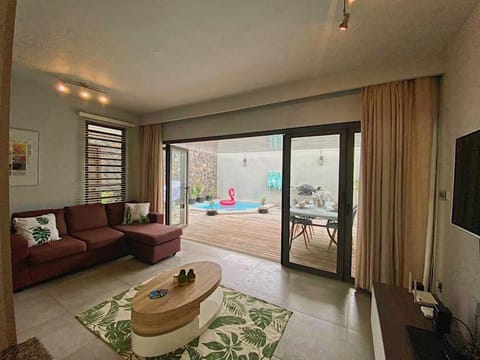 Living room, Seating area, Pool view