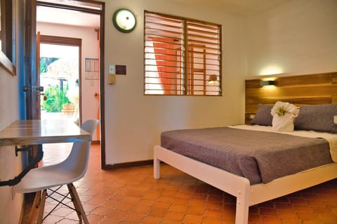 Bed, Seating area, Bedroom