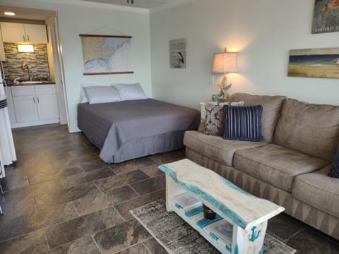 Bed, Living room, Seating area, Bedroom
