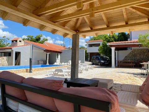 Patio, Day, Seating area, Pool view, Swimming pool, sunbed