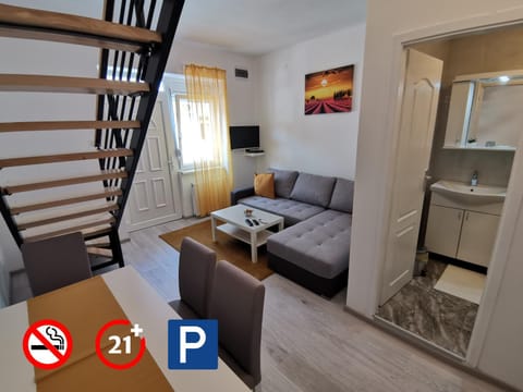 TV and multimedia, Living room, Seating area, Text overlay