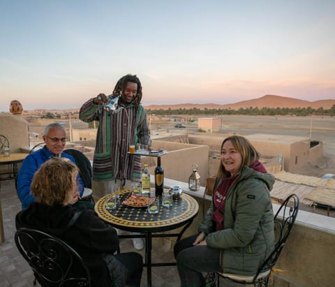 Patio, Day, People, Natural landscape, View (from property/room), Balcony/Terrace, Food and drinks, Dining area, Guests, Mountain view, Drinks, Alcoholic drinks, Sunrise, Sunset, group of guests