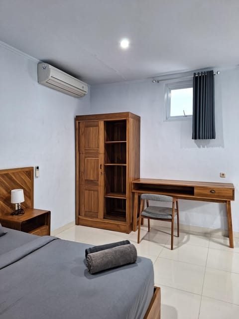 Bed, Seating area, Bedroom, wardrobe, air conditioner
