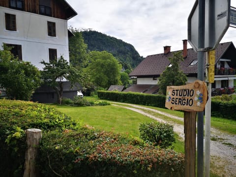 Property building, Day, Property logo or sign, Neighbourhood, Natural landscape, Logo/Certificate/Sign, Text overlay