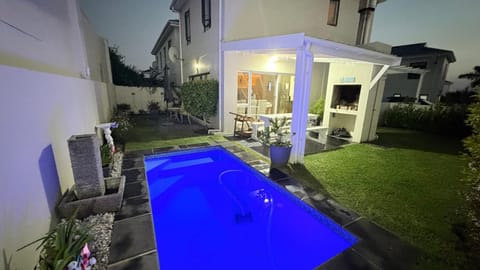 Property building, Patio, Night, Garden, Balcony/Terrace, Garden view, Pool view, Swimming pool