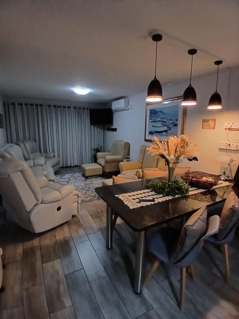 Property building, TV and multimedia, Living room, Seating area, Dining area