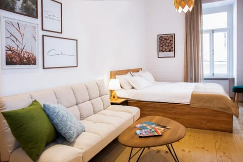 Bed, Living room, Seating area, Bedroom