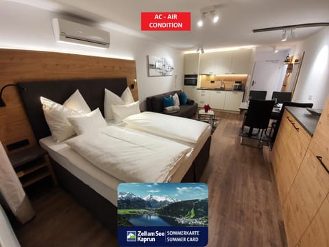 Bed, Living room, Seating area, Bedroom