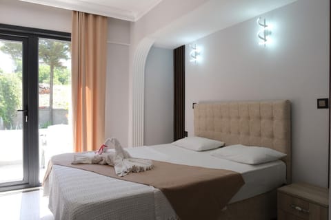 Bed, Natural landscape, View (from property/room), Garden view, towels