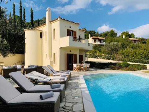 Property building, Patio, Seating area, Pool view, Swimming pool, sunbed