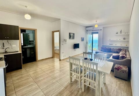 TV and multimedia, Kitchen or kitchenette, Living room, Seating area, Dining area, Sea view, Sea view, oven