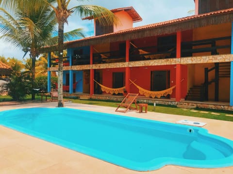 Property building, Day, Pool view, Swimming pool, sunbed