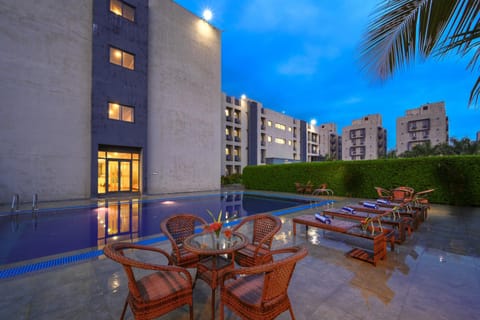 Property building, View (from property/room), Seating area, Pool view, sunbed
