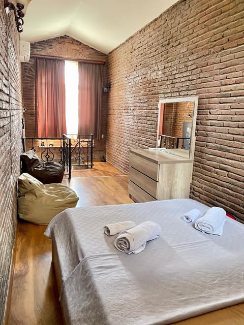 Bed, Bedroom, towels, wardrobe, air conditioner