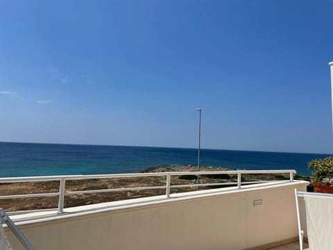 Property building, Nearby landmark, Day, Natural landscape, View (from property/room), Balcony/Terrace, Beach, Landmark view, Landmark view, Sea view