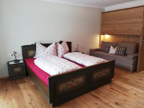 Bed, Seating area, Bedroom