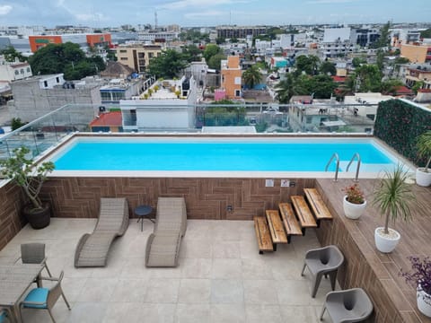 View (from property/room), Balcony/Terrace, City view, Pool view, Swimming pool, sunbed