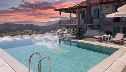 Property building, Natural landscape, Mountain view, Pool view, Swimming pool, sunbed