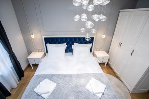 Bed, Living room, Photo of the whole room, Bedroom, towels, wardrobe