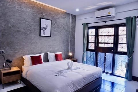 Bed, Photo of the whole room, Bedroom, towels, air conditioner