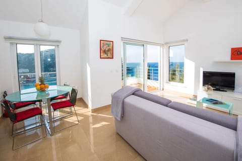 Living room, Seating area, Dining area, Sea view