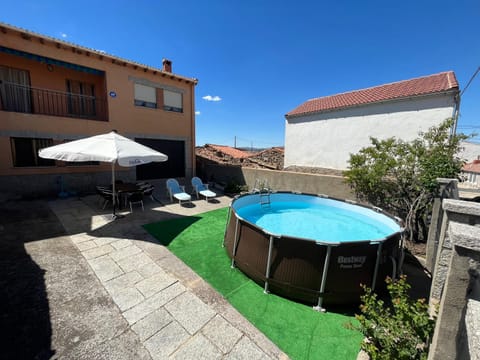 Patio, Day, Pool view, Swimming pool, sunbed