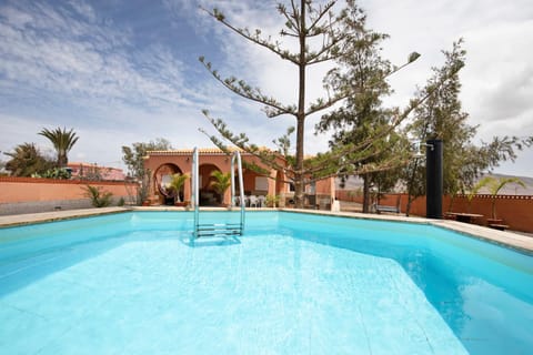 Property building, Living room, Swimming pool