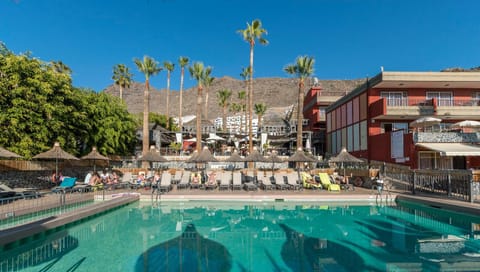 Property building, People, Pool view, Swimming pool, sunbed